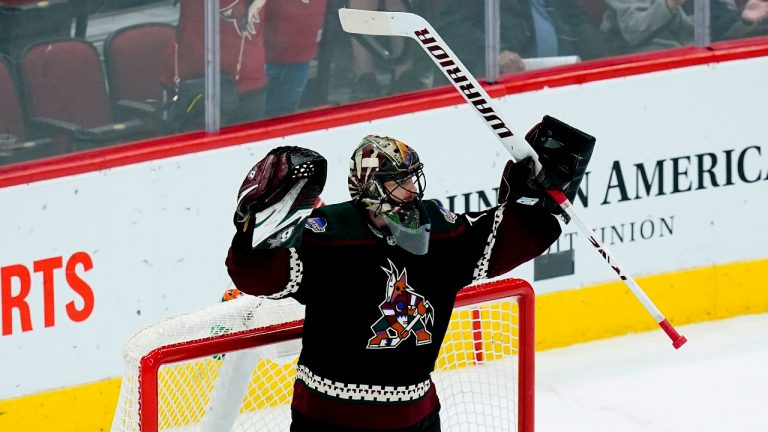 Arizona Coyotes goaltender Karel Vejmelka celebrates as time expires in the team's 2-1 win over the Colorado Avalanche in an NHL hockey game Thursday, March 3, 2022, in Glendale, Ariz. (Ross D. Franklin/AP)