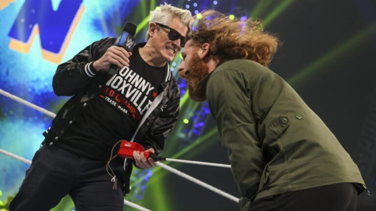 Sami Zayn, right, and Johnny Knoxville, pictured above.