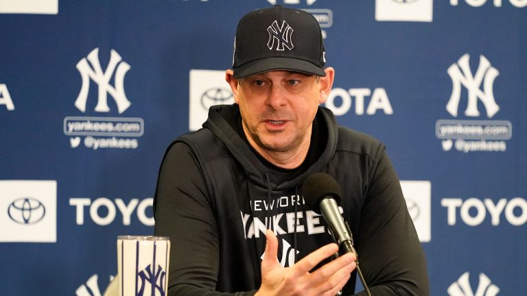 New York Yankees manager Aaron Boone answers questions at spring training baseball news conference. (John Raoux/AP)