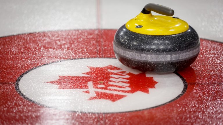 A curling stone sits on the ice during a practice session at the Tim Hortons Brier in Lethbridge, Alta., Friday, March 4, 2022. (Jeff McIntosh/CP)