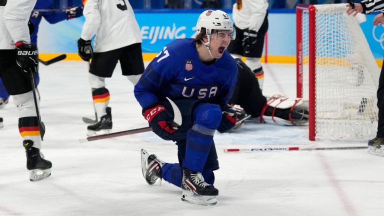 United States' Matt Knies celebrates a goal during a preliminary round men's hockey game against Germany at the 2022 Winter Olympics, Sunday, Feb. 13, 2022, in Beijing. (Petr David Josek/AP)