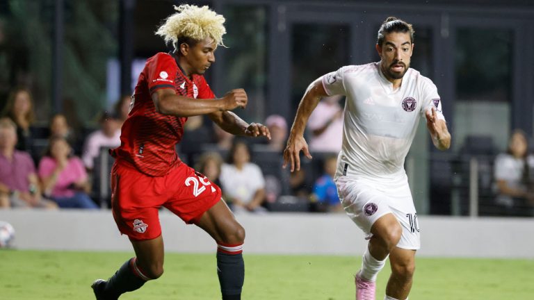 Inter Miami midfielder Rodolfo Pizarro (10) moves the ball past Toronto FC defender Luke Singh (26) during the first half of an MLS soccer match. (Rhona Wise/AP)