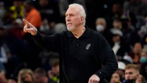 San Antonio Spurs head coach Gregg Popovich signals to his players during the first half of an NBA basketball game. (Eric Gay/AP)