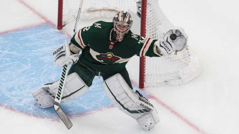 Minnesota Wild goalie Alex Stalock (32) makes a save against the Colorado Avalanche during second period NHL exhibition game action in Edmonton, on Wednesday July 29, 2020. (Jason Franson/CP)