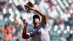 Boston Red Sox third baseman Rafael Devers catches the popup hit by Detroit Tigers' Dustin Garneau during the fifth inning of a baseball game, Tuesday, April 12, 2022, in Detroit. (Carlos Osorio/AP)