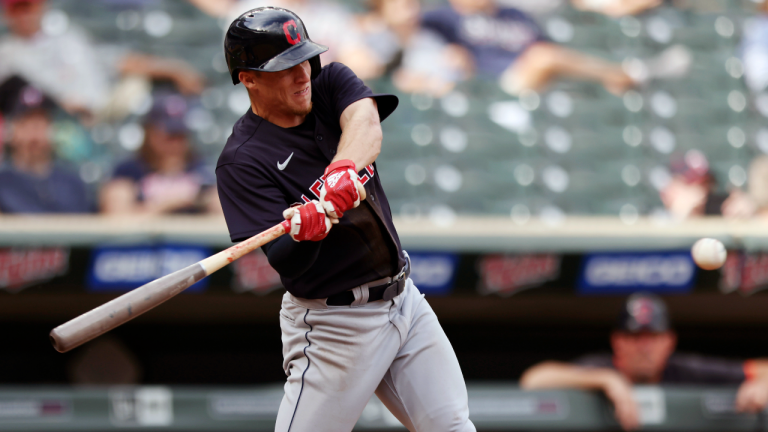 Cleveland's Myles Straw hits a single drive to Minnesota Twins' Joe Ryan during the sixth inning of the first baseball game of a doubleheader Tuesday, Sept. 14, 2021, in Minneapolis. (AP)