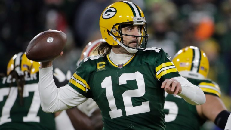 Green Bay Packers' Aaron Rodgers throws during the first half of an NFC divisional playoff game against the San Francisco 49ers. (Aaron Gash/AP)