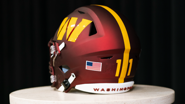 The helmet of Washington Commanders NFL football team new quarterback Carson Wentz sits on a table during a news conference in Ashburn, Va., Thursday, March 17, 2022. (AP/file)