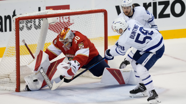 Florida Panthers goaltender Spencer Knight (30) blocks a shot by Toronto Maple Leafs left wing Michael Bunting (58) during the second period of an NHL hockey game Tuesday, April 5, 2022, in Sunrise, Fla. (AP)