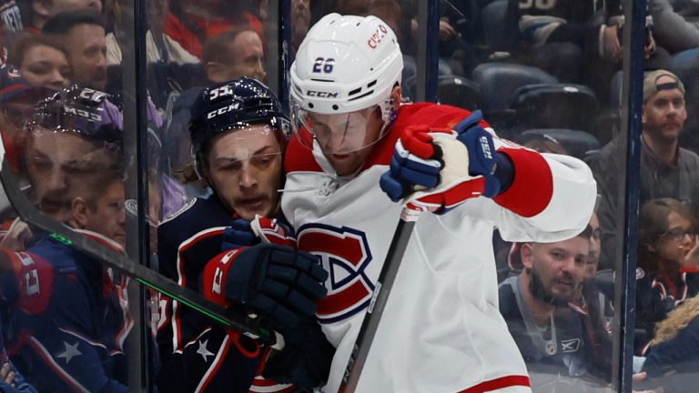 Montreal Canadiens' Jeff Petry, right, checks Columbus Blue Jackets' Carson Meyer during the second period of an NHL hockey game Wednesday, April 13, 2022, in Columbus, Ohio. (AP Photo/Jay LaPrete)