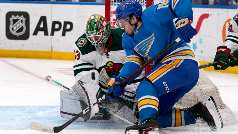 St. Louis Blues' Robert Thomas, right, is unable to score past Minnesota Wild goaltender Cam Talbot during the second period of an NHL hockey game Saturday, April 16, 2022, in St. Louis. (AP/file)