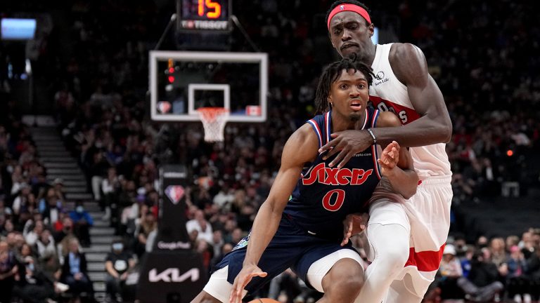 Philadelphia 76ers guard Tyrese Maxey (0) drives against Toronto Raptors forward Pascal Siakam (43) during second half NBA first round playoff action in Toronto, Saturday, April 23, 2022. (Nathan Denette/CP)