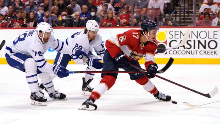 Florida Panthers left wing Mason Marchment (17) tries to shoot as Toronto Maple Leafs defenseman TJ Brodie (78) and right wing William Nylander (88) defend during the second period of an NHL hockey game Saturday, April 23, 2022, in Sunrise, Fla. (AP)