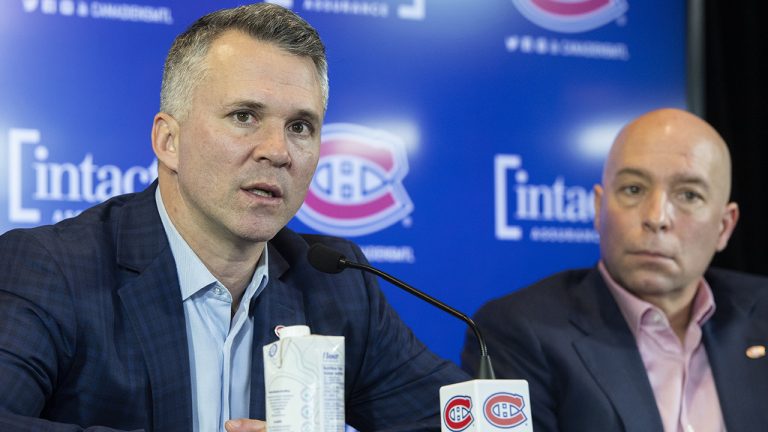 New Montreal Canadiens interim head coach Martin St. Louis, left, and Canadiens General Manager Kent Hughes speak to media. (Graham Hughes/CP)