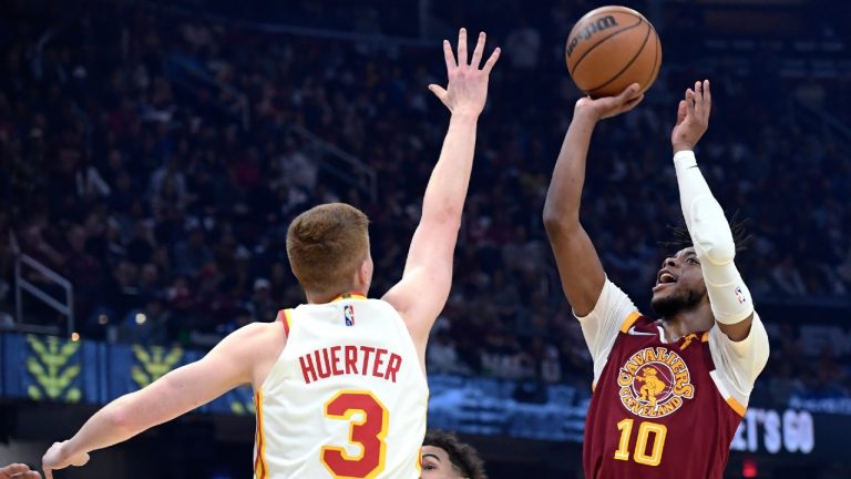 The Cavaliers' Darius Garland shoots against Atlanta's Kevin Huerter during the first half of an NBA play-in game Friday in Cleveland. (Nick Cammett/THE ASSOCIATED PRESS)