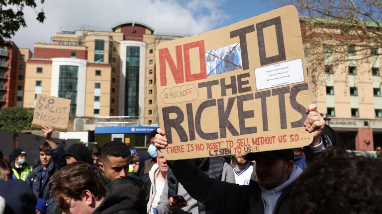 Chelsea fans stage a protest prior to the start of the English Premier League soccer match between Chelsea and Brentford, outside the Stamford Bridge stadium in London, Saturday, April 2, 2022. (Ian Walton/AP)