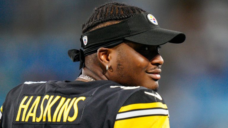 Pittsburgh Steelers quarterback Dwayne Haskins smiles on the sidelines during the second half of a preseason NFL football game against the Carolina Panthers Friday, Aug. 27, 2021, in Charlotte, N.C. (Jacob Kupferman/AP)