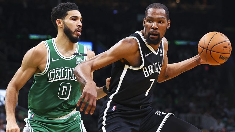 Kevin Durant of the Brooklyn Nets posts up on Jayson Tatum of the Boston Celtics. The two will go head-to-head in Round 1 of the NBA Playoffs. (Adam Glanzman/Getty)