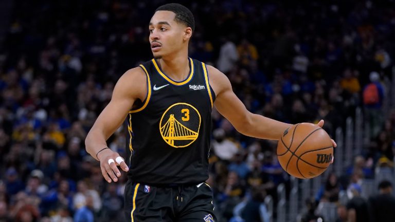 Golden State Warriors guard Jordan Poole brings the ball up during the second half of Game 1 of the team's NBA basketball first-round playoff series against the Denver Nuggets in San Francisco, Saturday, April 16, 2022. (Jeff Chiu/AP)