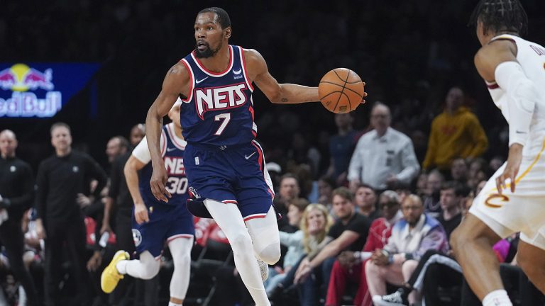 Brooklyn Nets forward Kevin Durant (7) dribbles down court during the second half of an NBA basketball game against the Cleveland Cavaliers. (Bebeto Matthews/AP)