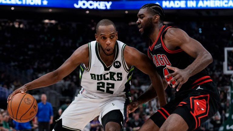 Milwaukee Bucks' Khris Middleton tries to get past Chicago Bulls' Patrick Williams during the first half of Game 2 of their first round NBA playoff basketball game Wednesday, April 20, 2022, in Milwaukee. (Morry Gash/AP)