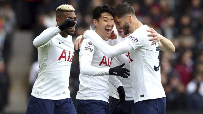 Tottenham Hotspur's Son Heung-min, centre, celebrates scoring during the English Premier League soccer match between Aston Villa and Tottenham Hotspur at Villa Park, Birmingham, England, Saturday April 9, 2022. (Barrington Coombs/PA via AP)