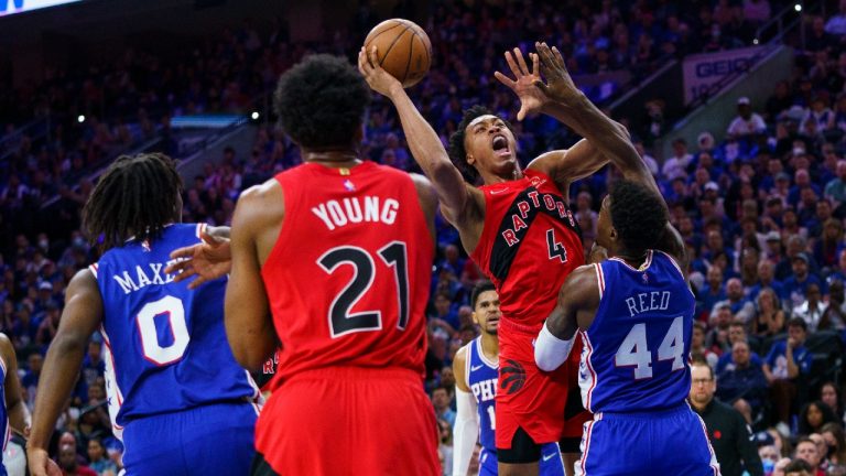 Toronto Raptors' Scottie Barnes, center right, goes up for the shot against Philadelphia 76ers' Paul Reed, right, during the first half of Game 1 of an NBA basketball first-round playoff series, Saturday, April 16, 2022, in Philadelphia. (Chris Szagola/AP)