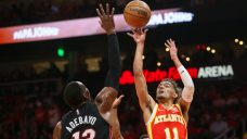 Young hits late floater to help Hawks beat Heat in Game 3