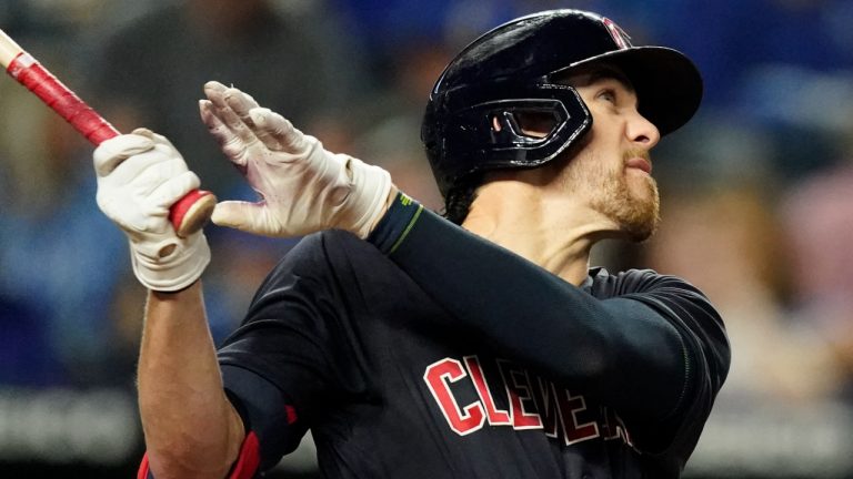 Cleveland Guardians' Bradley Zimmer watches an RBI sacrifice fly during the third inning of the team's baseball game against the Kansas City Royals on Sept. 30, 2021, in Kansas City, Mo. The Guardians have traded Zimmer to the Toronto Blue Jays for reliever Anthony Castro. (Charlie Riedel/AP)