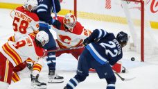 Jets down playoff-bound Flames in penultimate game of season