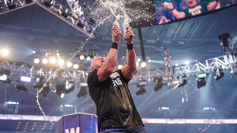 "Stone Cold" Steve Austin toasts the AT&T Stadium crowd during WrestleMania 38 on Sunday. (Photo Credit: WWE)