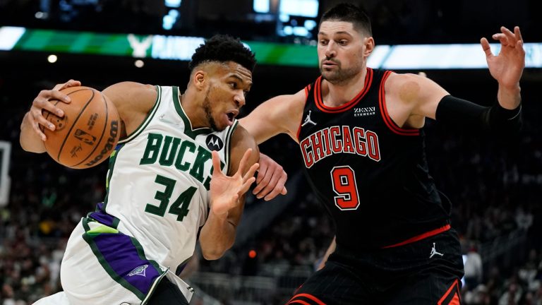 Milwaukee Bucks' Giannis Antetokounmpo tries to get past Chicago Bulls' Nikola Vucevic during the first half of Game 1 of their first round NBA playoff basketball game. (Morry Gash/AP)