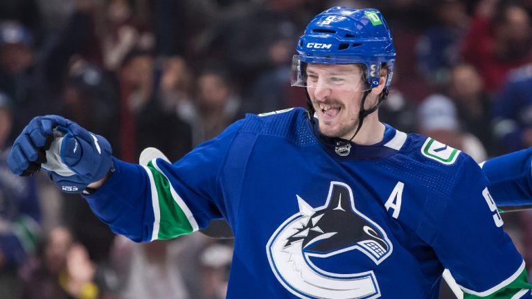 Vancouver Canucks' J.T. Miller celebrates his goal against the Vegas Golden Knights during the third period of an NHL hockey game in Vancouver, B.C., Sunday, April 3, 2022. (Darryl Dyck/CP) 