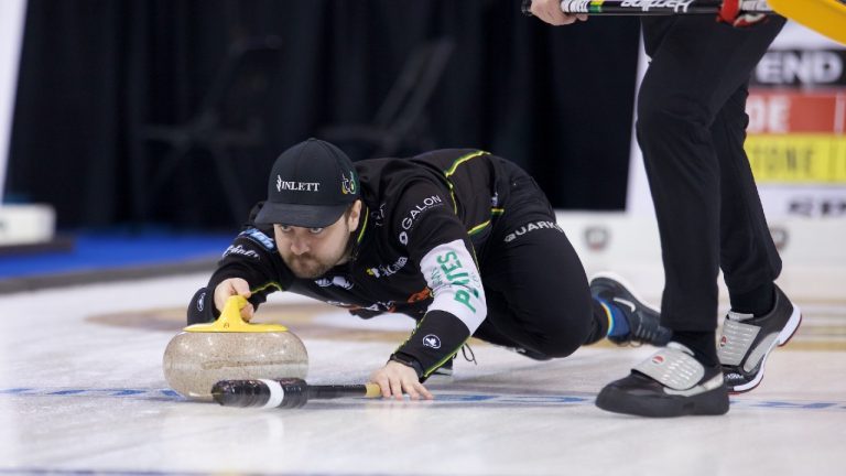 Matt Dunstone shoots a rock during the Princess Auto Players' Championship on April 16, 2022, at Toronto's Mattamy Athletic Centre. (Anil Mungal)