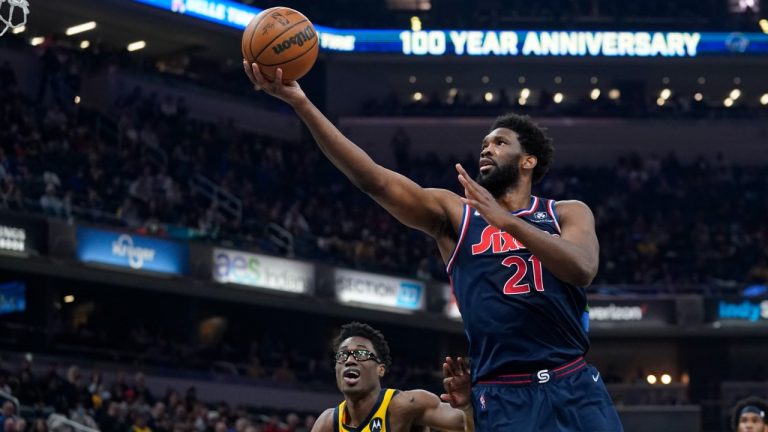 Philadelphia 76ers' Joel Embiid shoots against Indiana Pacers' Jalen Smith during the first half of an NBA basketball game Tuesday, April 5, 2022, in Indianapolis. (Darron Cummings/AP)