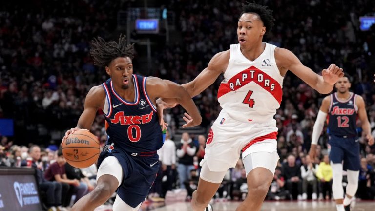 Philadelphia 76ers guard Tyrese Maxey (0) drives against Toronto Raptors forward Scottie Barnes (4) during second half NBA first round playoff action in Toronto, Saturday, April 23, 2022. (Nathan Denette/CP)