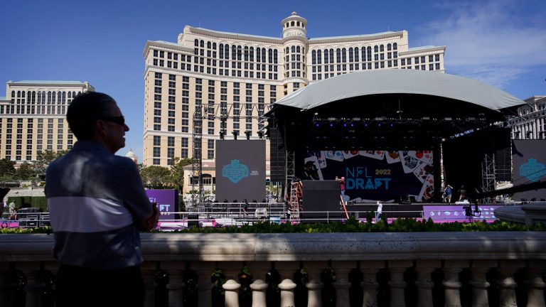 People look at the stage during setup for the NFL draft. (John Locher/AP)