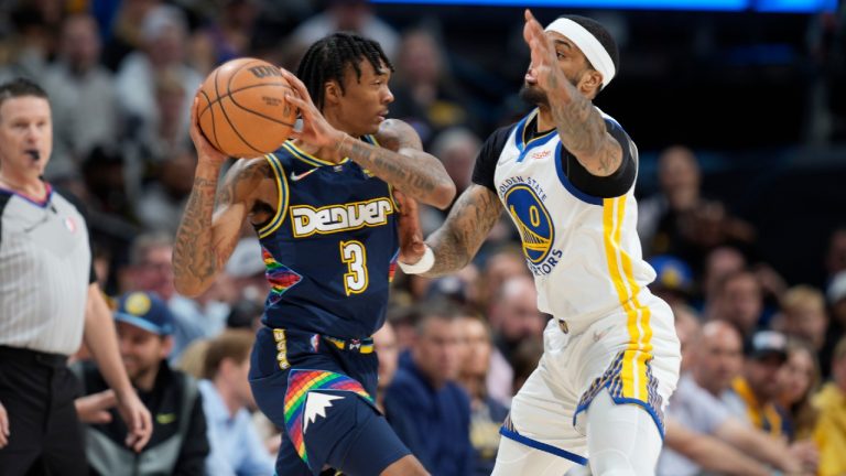 Denver guard Bones Hyland and the Nuggets will be looking to avoid playoff elimination on Wednesday night against Gary Payton II and the Warriors. (David Zalubowski/AP)