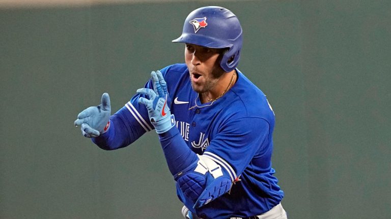 Toronto Blue Jays' George Springer celebrates after hitting a home run against the Houston Astros during the first inning of a baseball game. (David J. Phillip/AP)