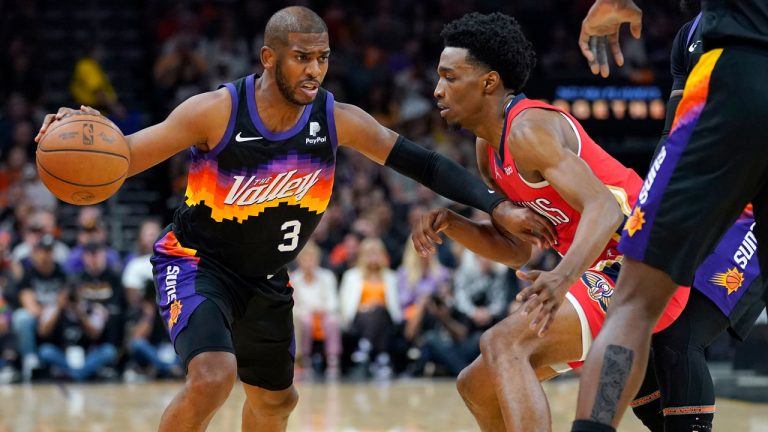 Phoenix Suns guard Chris Paul (3) drives as New Orleans Pelicans forward Herbert Jones defends during the first half of Game 1 of an NBA basketball first-round playoff series. (Matt York/AP)