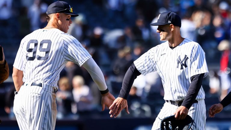 New York Yankees first baseman Anthony Rizzo and right fielder Aaron Judge (99) shake hands after a baseball game against the Cleveland Guardians, (Jessie Alcheh/AP)