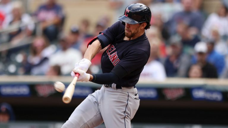 Cleveland’s Bradley Zimmer (4) hits a homer during the fifth inning of the first baseball game of a doubleheader against the Minnesota Twins, Tuesday, Sept. 14, 2021, in Minneapolis. Cleveland won 3-1. (Stacy Bengs/AP)