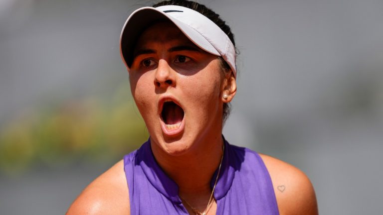 Bianca Andreescu, of Canada, reacts during a match against Danielle Collins, of USA, at the Mutua Madrid Open tennis tournament in Madrid, Sunday, May 1, 2022. (Bernat Armangue/AP Photo)