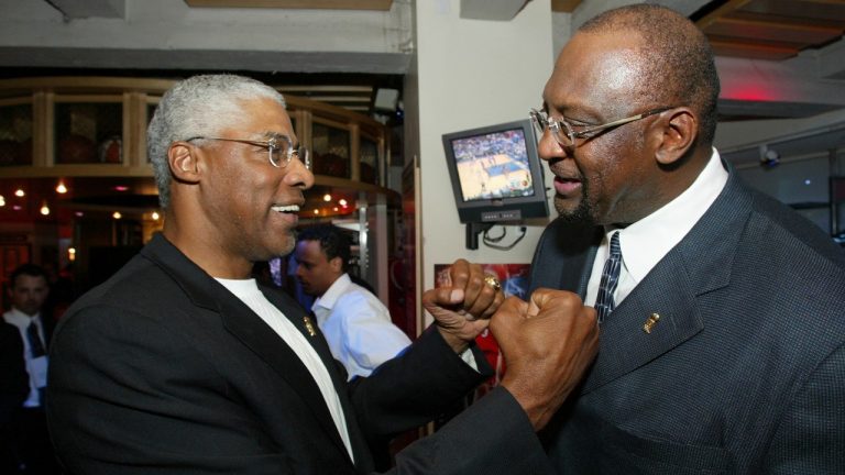 Bob Lanier, right, a big man who muscled up beside the likes of Kareem Abdul-Jabbar as one of the NBA's top players of the 1970s, died Tuesday, May 10, 2022. He was 73. (Stuart Ramson/AP)