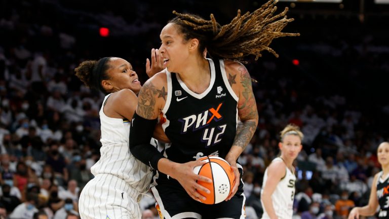 Phoenix Mercury center Brittney Griner (42) looks to shoot as Chicago Sky forward/center Azurá Stevens defends during the first half of game 1 of the WNBA basketball Finals , Sunday, Oct. 10, 2021, in Phoenix.(Ralph Freso/AP)