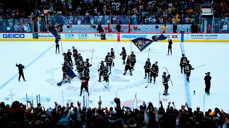 Arizona Coyotes players acknowledge the crowd after an NHL hockey game between the Coyotes and the Nashville Predators Friday, April 29, 2022, in Glendale, Ariz. The Coyotes played their final game at Gila River Arena. (AP)