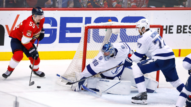 Tampa Bay Lightning defenseman Victor Hedman (77) and goaltender Andrei Vasilevskiy (88) defend against the attack from Florida Panthers center Noel Acciari (55) during the third period of Game 2 of an NHL hockey second-round playoff series Thursday, May 19, 2022, in Sunrise, Fla. (AP)