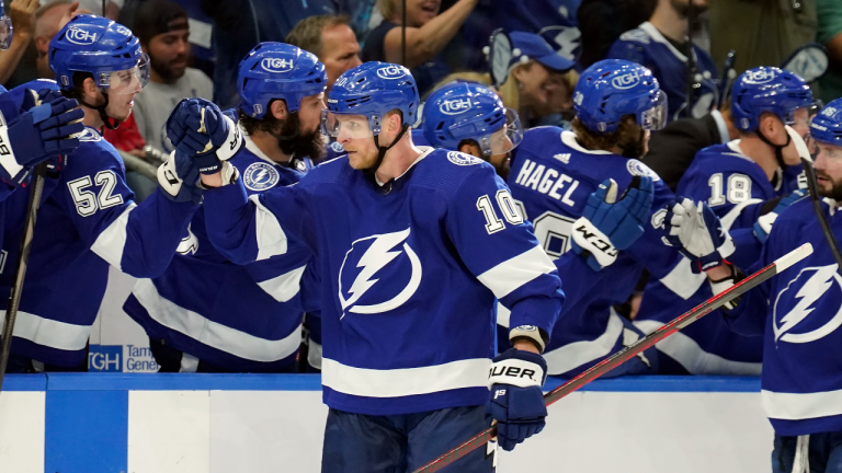 Tampa Bay Lightning right wing Corey Perry (10) celebrates with the bench after his goal against the Florida Panthers during the first period in Game 3 of an NHL hockey second-round playoff series Sunday, May 22, 2022, in Tampa, Fla. (AP)