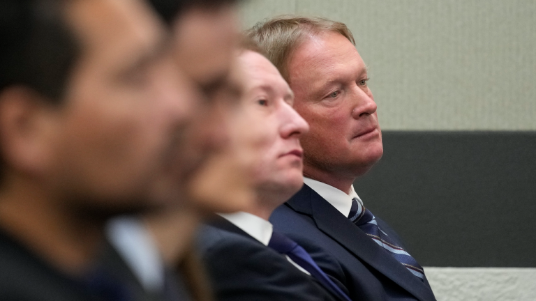 Jon Gruden, right, waits in court Wednesday, May 25, 2022, in Las Vegas. (AP)