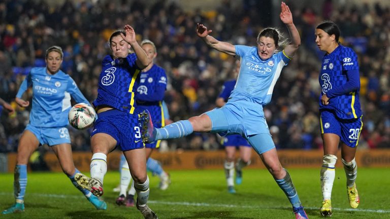 Chelsea's Aniek Nouwen (left) and Manchester City's Ellen White (centre) battle for the ball during the The FA Women's Continental Tyres League Cup final at the Cherry Red Records Stadium, London. Picture date: Saturday March 5, 2022.